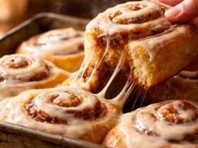 Use bread flour instead of all-purpose flour for a slightly chewier and taller roll. Pour a little heavy cream over the rolls before baking for an extra gooey bottom. Add chopped pecans or walnuts to the filling for a nice and salty crunch. Use a zester to add orange peel to the frosting for a bright, citrusy flavor. Make sure your milk is not too hot, or it will kill the yeast instantly. Frost the rolls while they are still warm so the icing seeps into the middle.